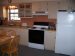 Kitchen has full sized appliances and is well stocked for monthly stays